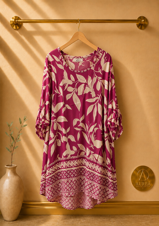 Vestido amplio floral fucsia con cenefa